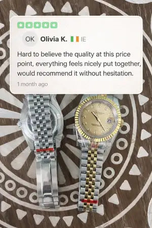 A gold and silver two-tone rolex datejust watch with a diamond bezel, featuring a classic round face and linked bracelet.